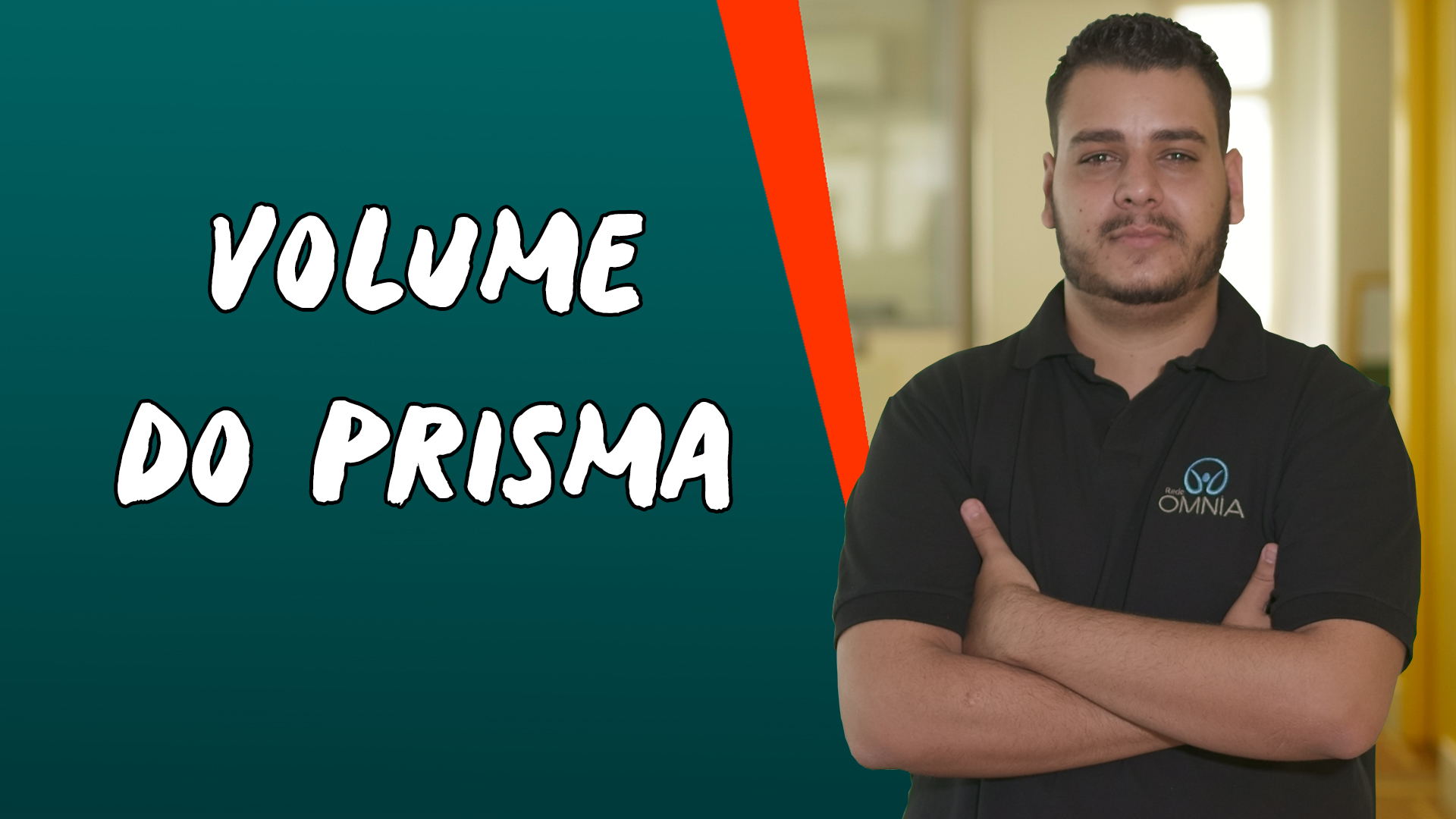 Professor ao lado do texto"Volume do Prisma".